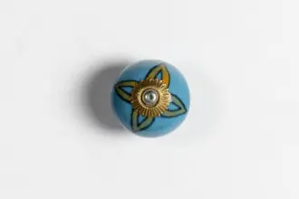 Uchwyt ceramiczny kulka 4cm - cyjanowy z żółtym kwiatkiem 1